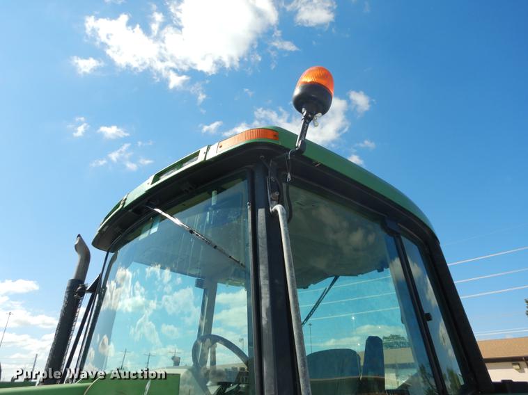 image for item DF1762 2001 John Deere 6310 MFWD tractor