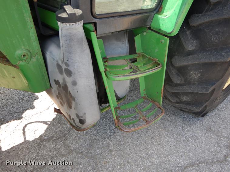 image for item DF1762 2001 John Deere 6310 MFWD tractor