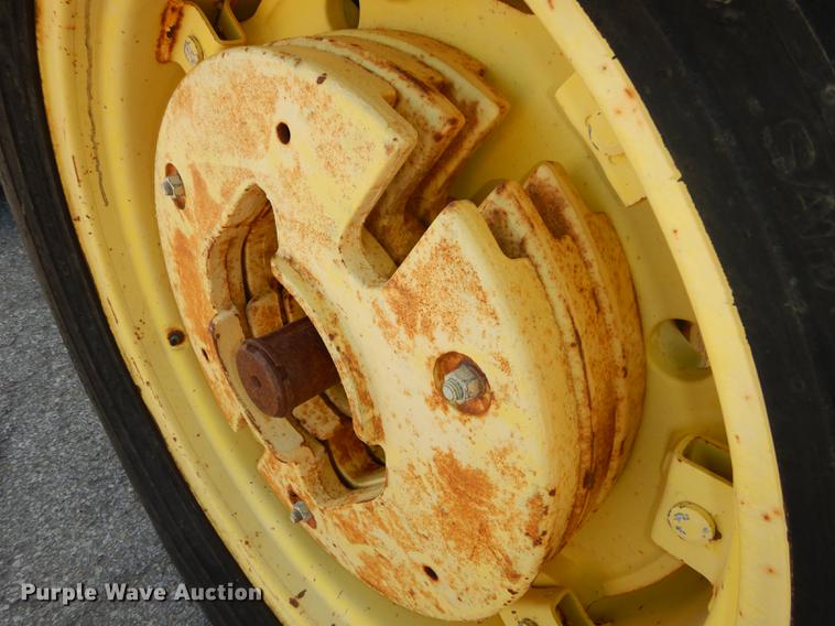 image for item DF1762 2001 John Deere 6310 MFWD tractor