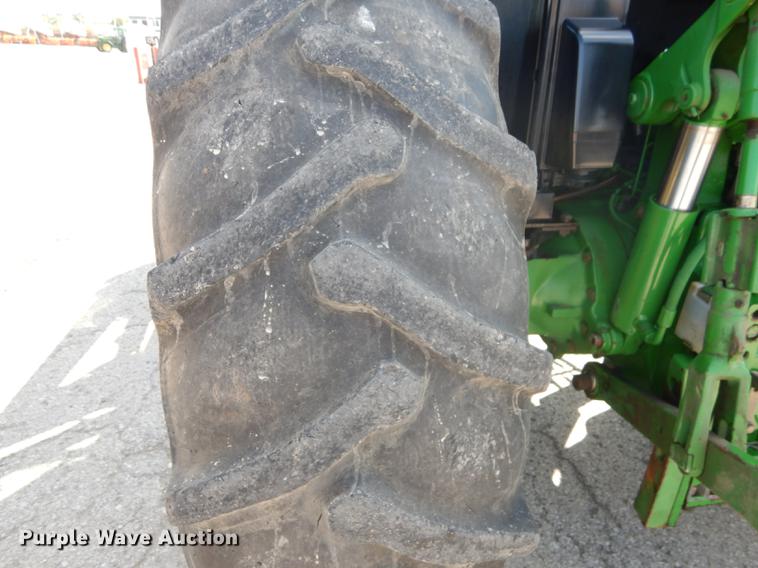 image for item DF1762 2001 John Deere 6310 MFWD tractor