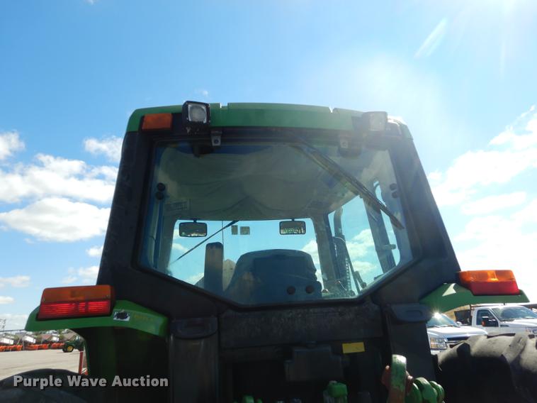 image for item DF1762 2001 John Deere 6310 MFWD tractor