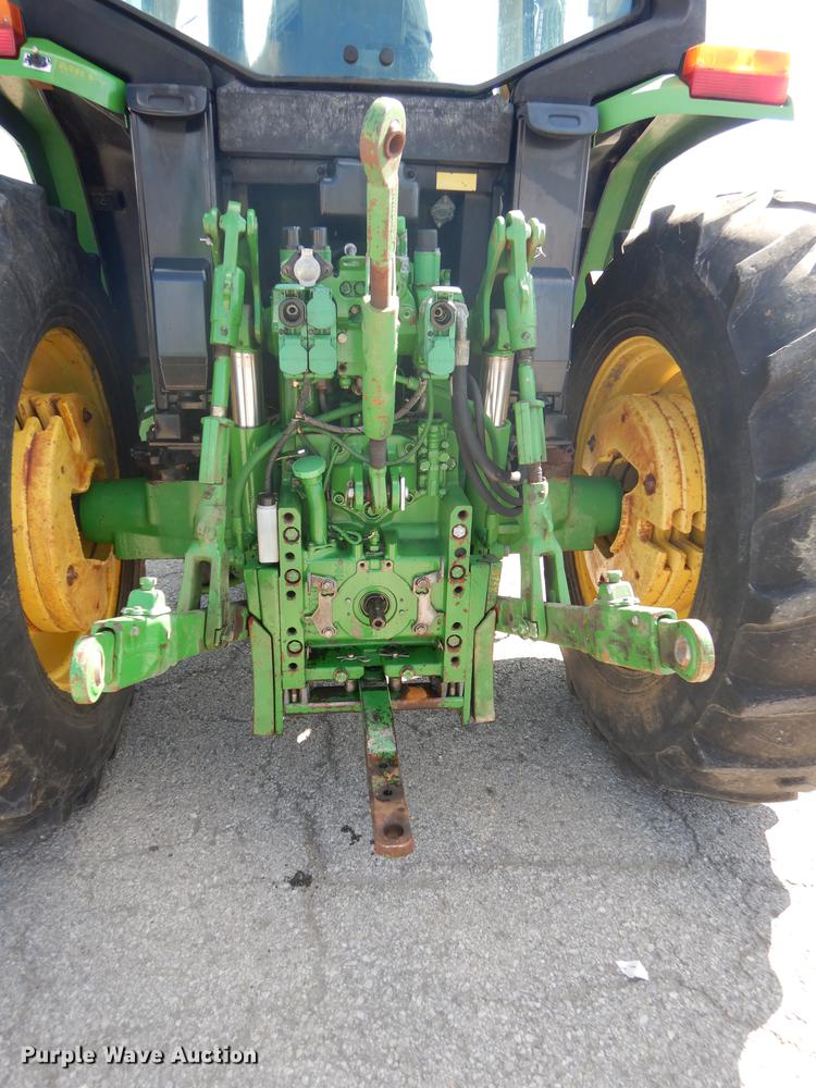 image for item DF1762 2001 John Deere 6310 MFWD tractor
