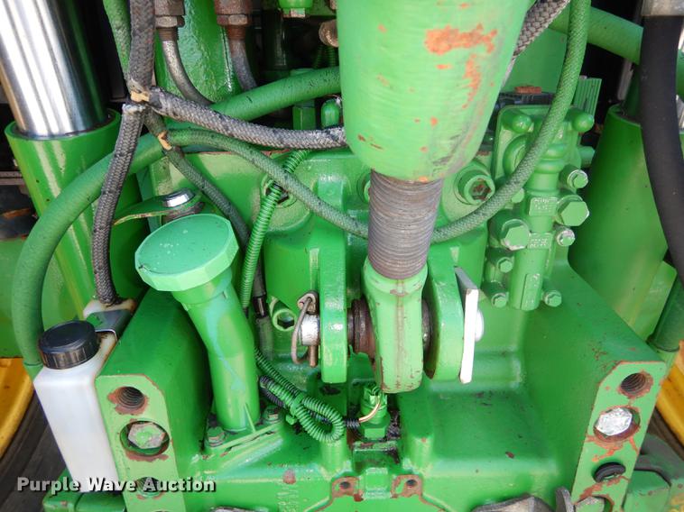 image for item DF1762 2001 John Deere 6310 MFWD tractor