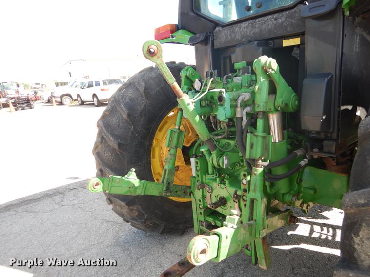 image for item DF1762 2001 John Deere 6310 MFWD tractor