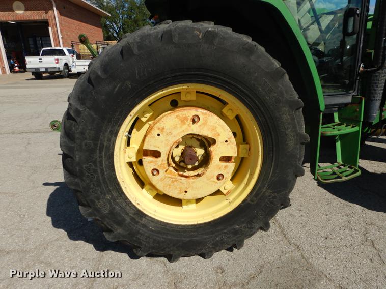 image for item DF1762 2001 John Deere 6310 MFWD tractor