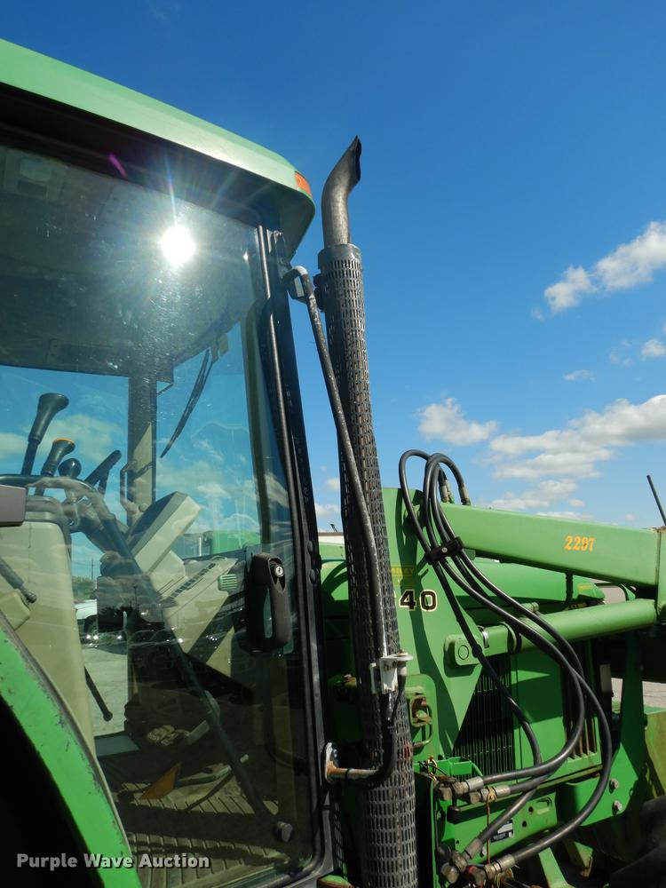 image for item DF1762 2001 John Deere 6310 MFWD tractor