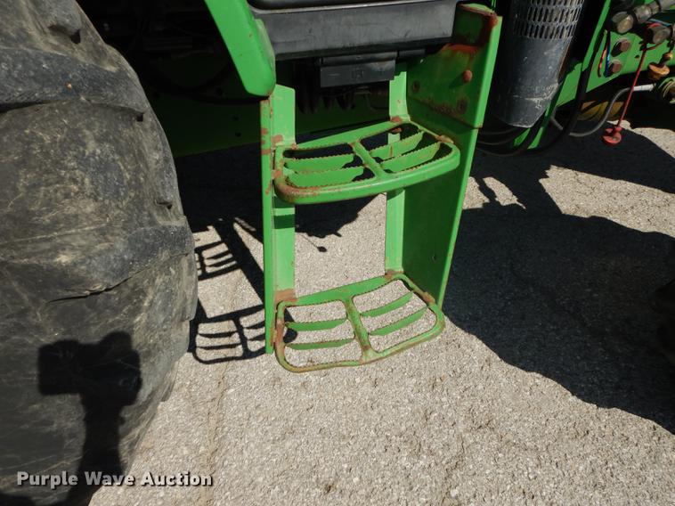 image for item DF1762 2001 John Deere 6310 MFWD tractor