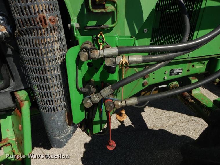 image for item DF1762 2001 John Deere 6310 MFWD tractor