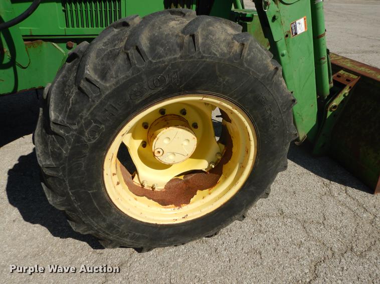 image for item DF1762 2001 John Deere 6310 MFWD tractor