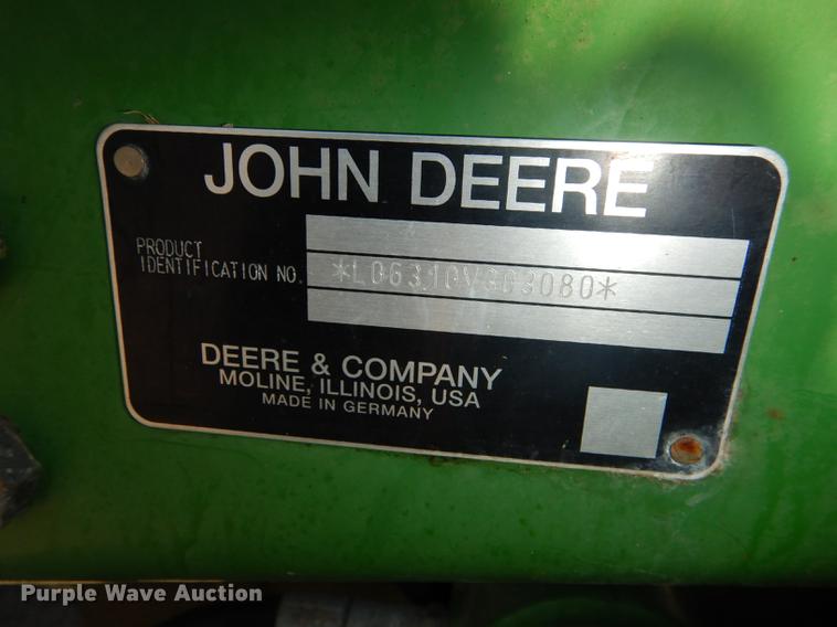 image for item DF1762 2001 John Deere 6310 MFWD tractor