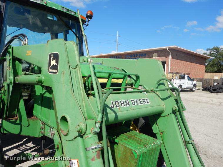 image for item DF1762 2001 John Deere 6310 MFWD tractor