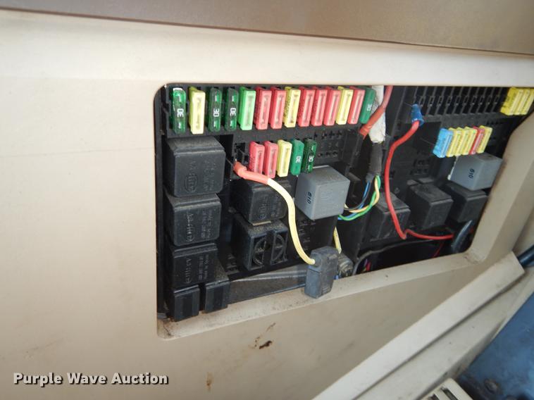 image for item DF1762 2001 John Deere 6310 MFWD tractor