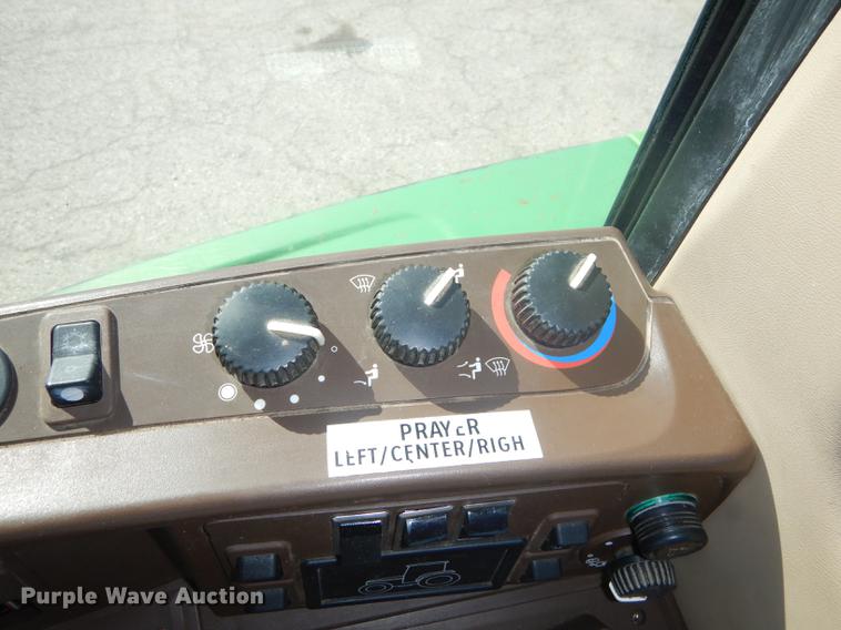 image for item DF1762 2001 John Deere 6310 MFWD tractor