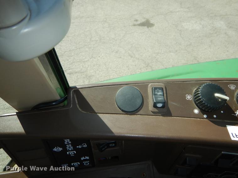 image for item DF1762 2001 John Deere 6310 MFWD tractor