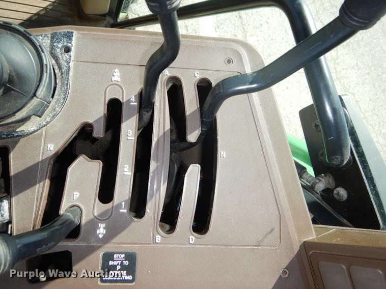 image for item DF1762 2001 John Deere 6310 MFWD tractor