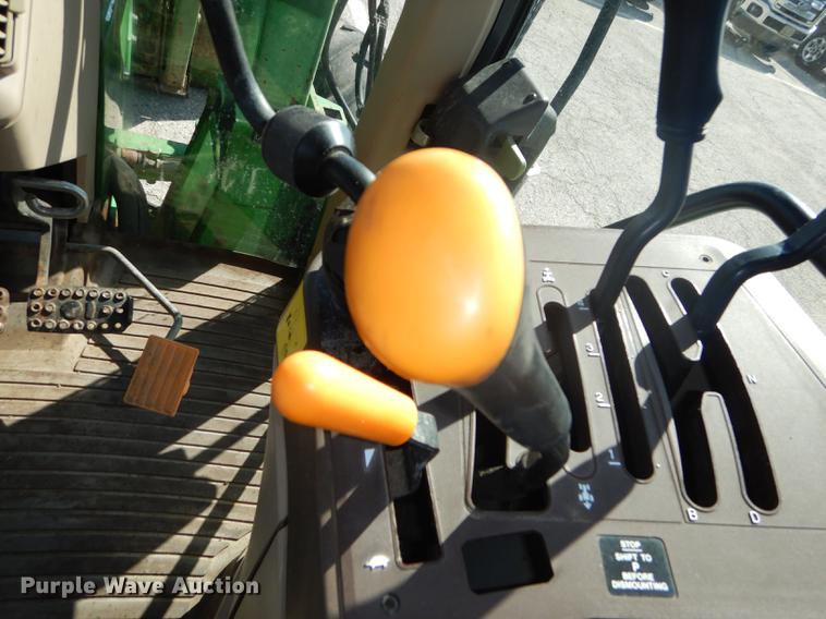 image for item DF1762 2001 John Deere 6310 MFWD tractor