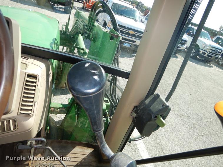 image for item DF1762 2001 John Deere 6310 MFWD tractor