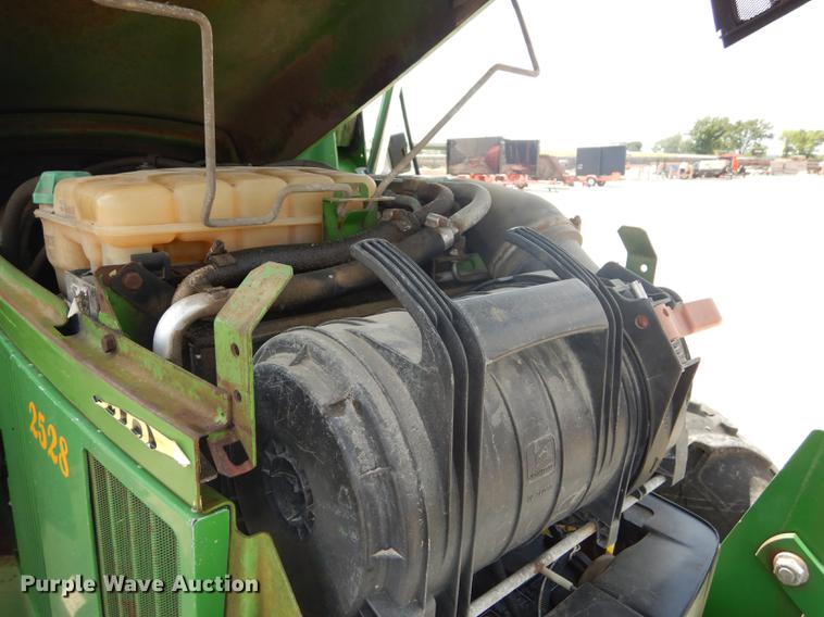 image for item DF1762 2001 John Deere 6310 MFWD tractor