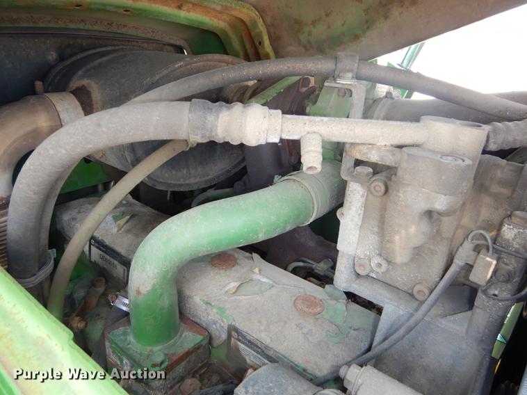image for item DF1762 2001 John Deere 6310 MFWD tractor