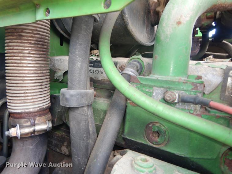 image for item DF1762 2001 John Deere 6310 MFWD tractor