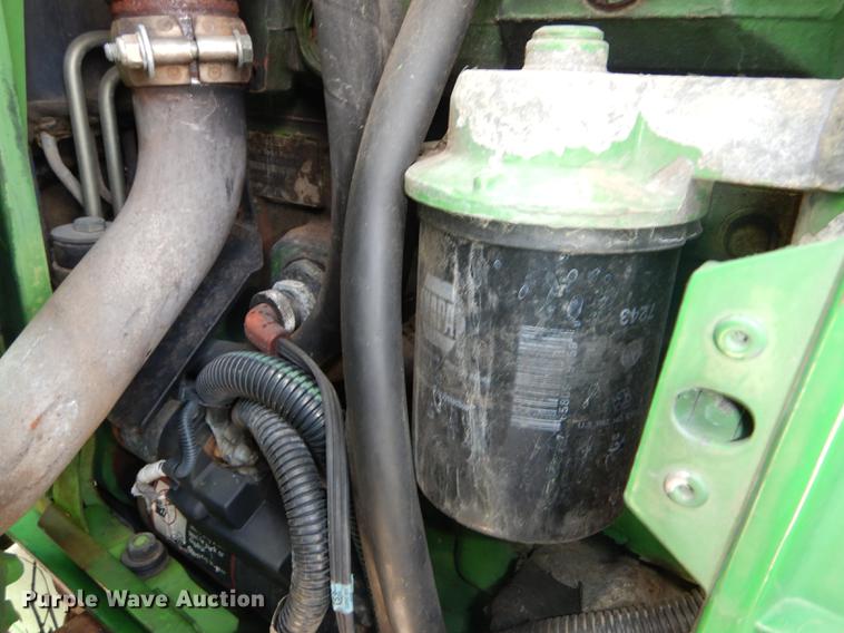 image for item DF1762 2001 John Deere 6310 MFWD tractor