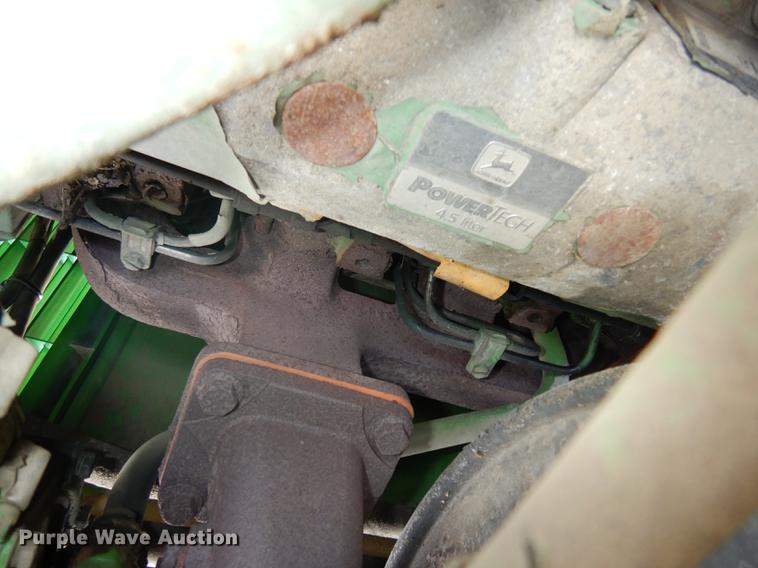 image for item DF1762 2001 John Deere 6310 MFWD tractor