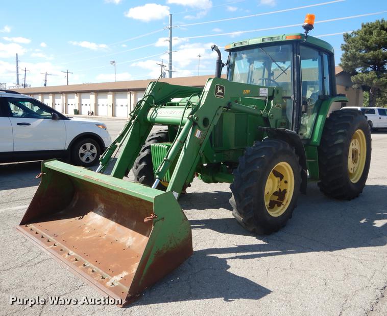 image for item DF1763 2001 John Deere 6310 MFWD tractor