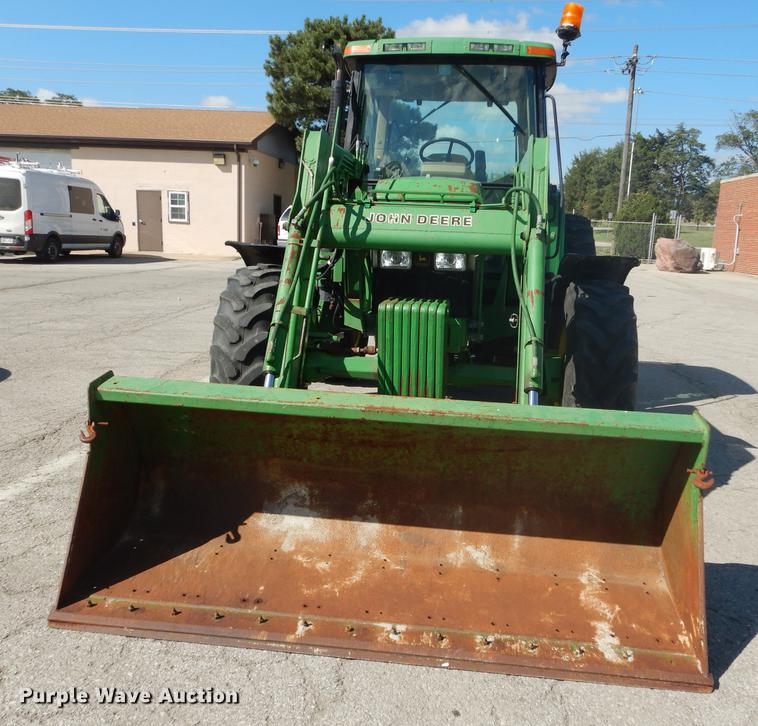 image for item DF1763 2001 John Deere 6310 MFWD tractor