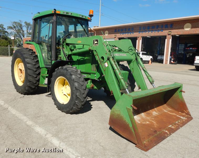 image for item DF1763 2001 John Deere 6310 MFWD tractor