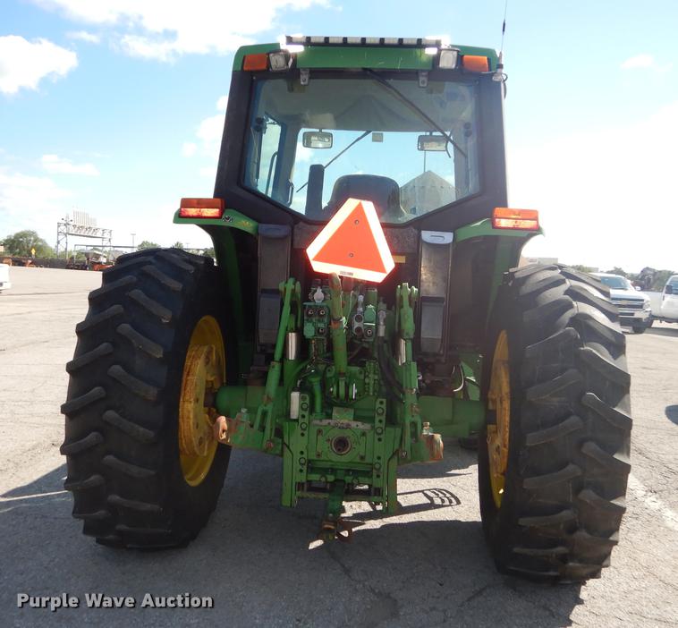 image for item DF1763 2001 John Deere 6310 MFWD tractor