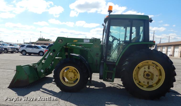 image for item DF1763 2001 John Deere 6310 MFWD tractor