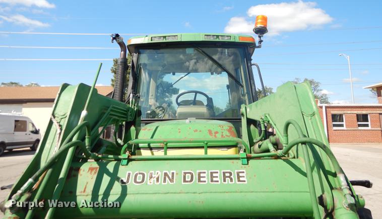 image for item DF1763 2001 John Deere 6310 MFWD tractor