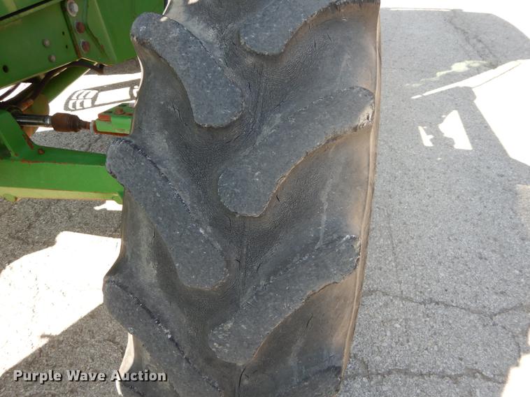 image for item DF1763 2001 John Deere 6310 MFWD tractor