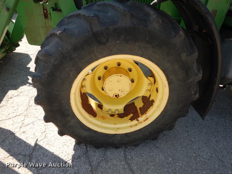 image for item DF1763 2001 John Deere 6310 MFWD tractor
