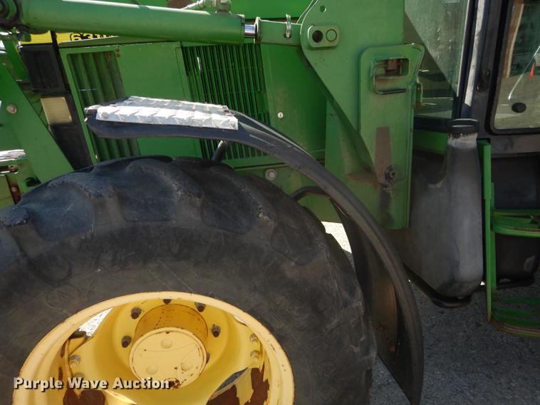image for item DF1763 2001 John Deere 6310 MFWD tractor