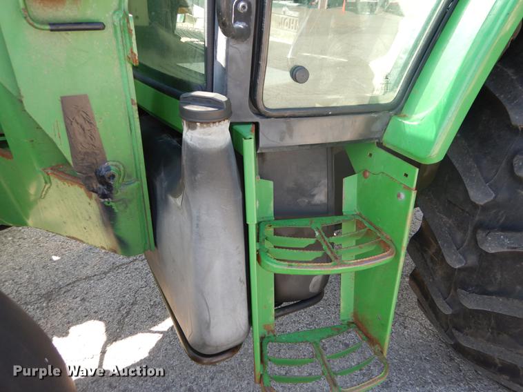 image for item DF1763 2001 John Deere 6310 MFWD tractor