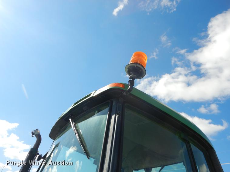 image for item DF1763 2001 John Deere 6310 MFWD tractor