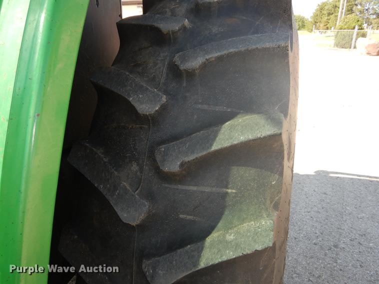 image for item DF1763 2001 John Deere 6310 MFWD tractor