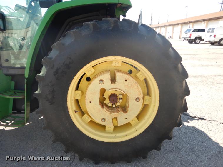 image for item DF1763 2001 John Deere 6310 MFWD tractor