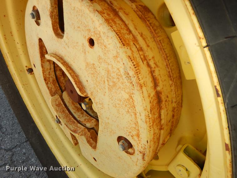 image for item DF1763 2001 John Deere 6310 MFWD tractor