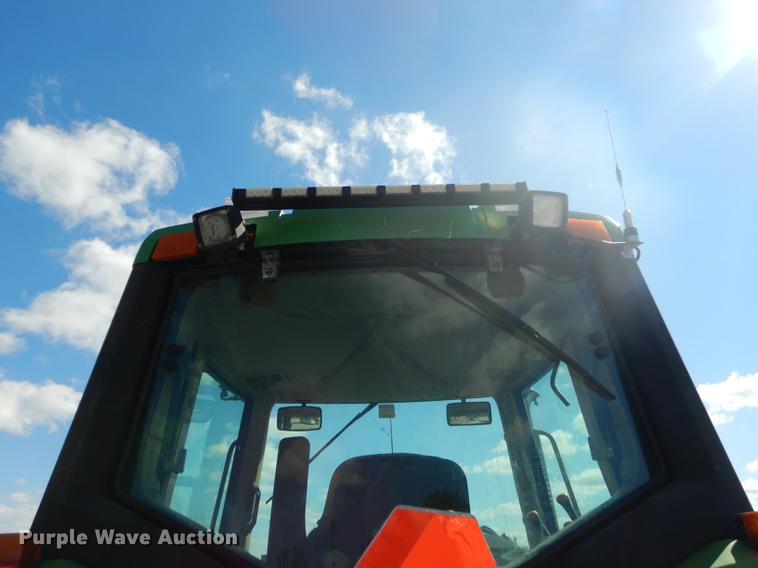 image for item DF1763 2001 John Deere 6310 MFWD tractor
