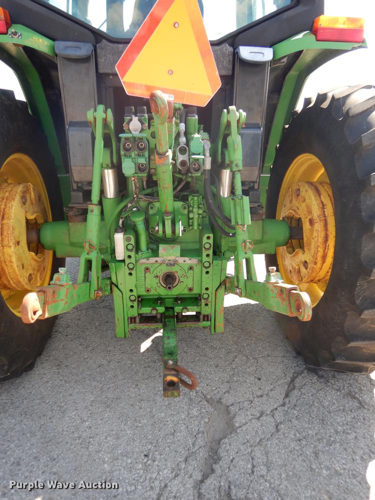 image for item DF1763 2001 John Deere 6310 MFWD tractor