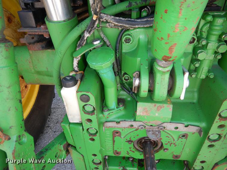 image for item DF1763 2001 John Deere 6310 MFWD tractor