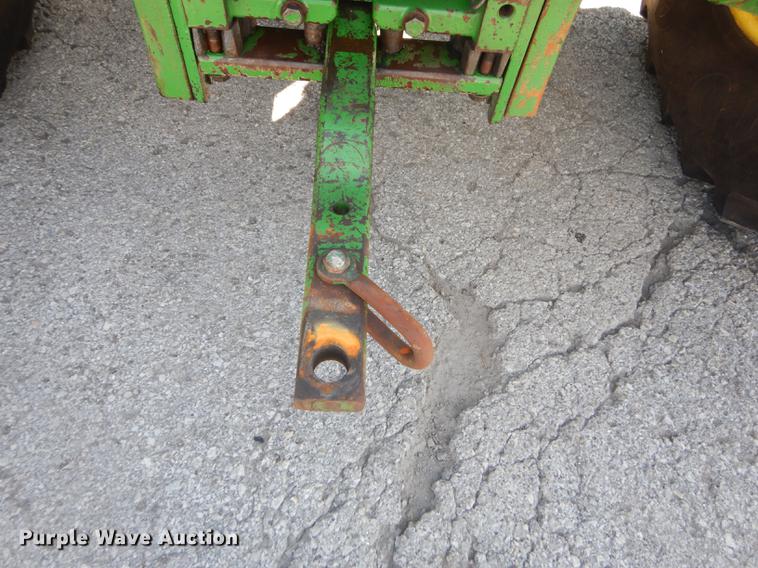 image for item DF1763 2001 John Deere 6310 MFWD tractor