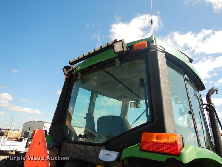image for item DF1763 2001 John Deere 6310 MFWD tractor