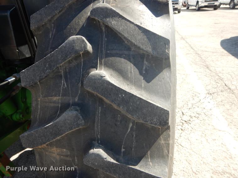 image for item DF1763 2001 John Deere 6310 MFWD tractor