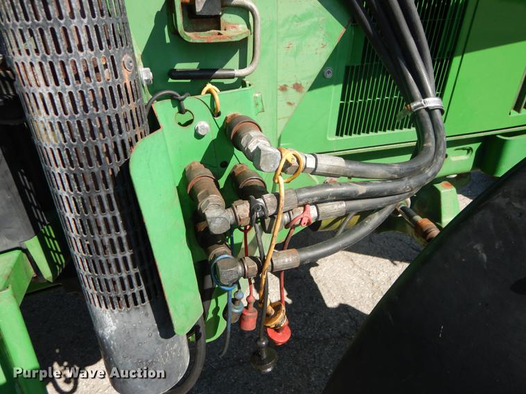 image for item DF1763 2001 John Deere 6310 MFWD tractor