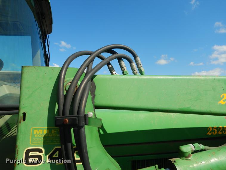 image for item DF1763 2001 John Deere 6310 MFWD tractor