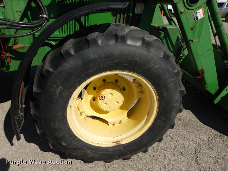 image for item DF1763 2001 John Deere 6310 MFWD tractor