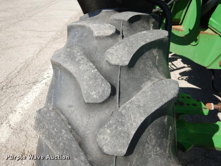 image for item DF1763 2001 John Deere 6310 MFWD tractor